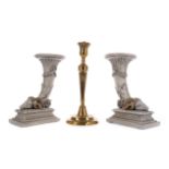 A PAIR OF 20TH CENTURY SIMULATED STONE CANDLESTICKS AND A BRASS CANDLESTICK