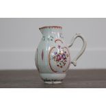 A MID-19TH CENTURY CONTINENTAL FAMILLE ROSE CREAM JUG