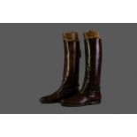 A PAIR OF VICTORIAN BROWN LEATHER RIDING BOOTS