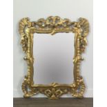 A GILTWOOD WALL MIRROR