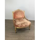 A 19TH CENTURY FRENCH GILTWOOD NURSING CHAIR