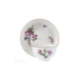 A MID-19TH CENTURY MEISSEN PORCELAIN TEA BOWL AND SAUCER