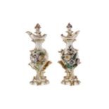 A PAIR OF EARLY 19TH CENTURY DERBY PORCELAIN EWERS AND STOPPERS