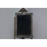 A VICTORIAN SILVER FRAMED MIRROR