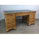 A MAHOGANY AND WALNUT KNEEHOLE DESK