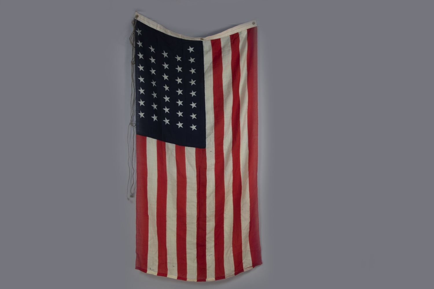 A MID-20TH CENTURY AMERICAN ENSIGN FLAG