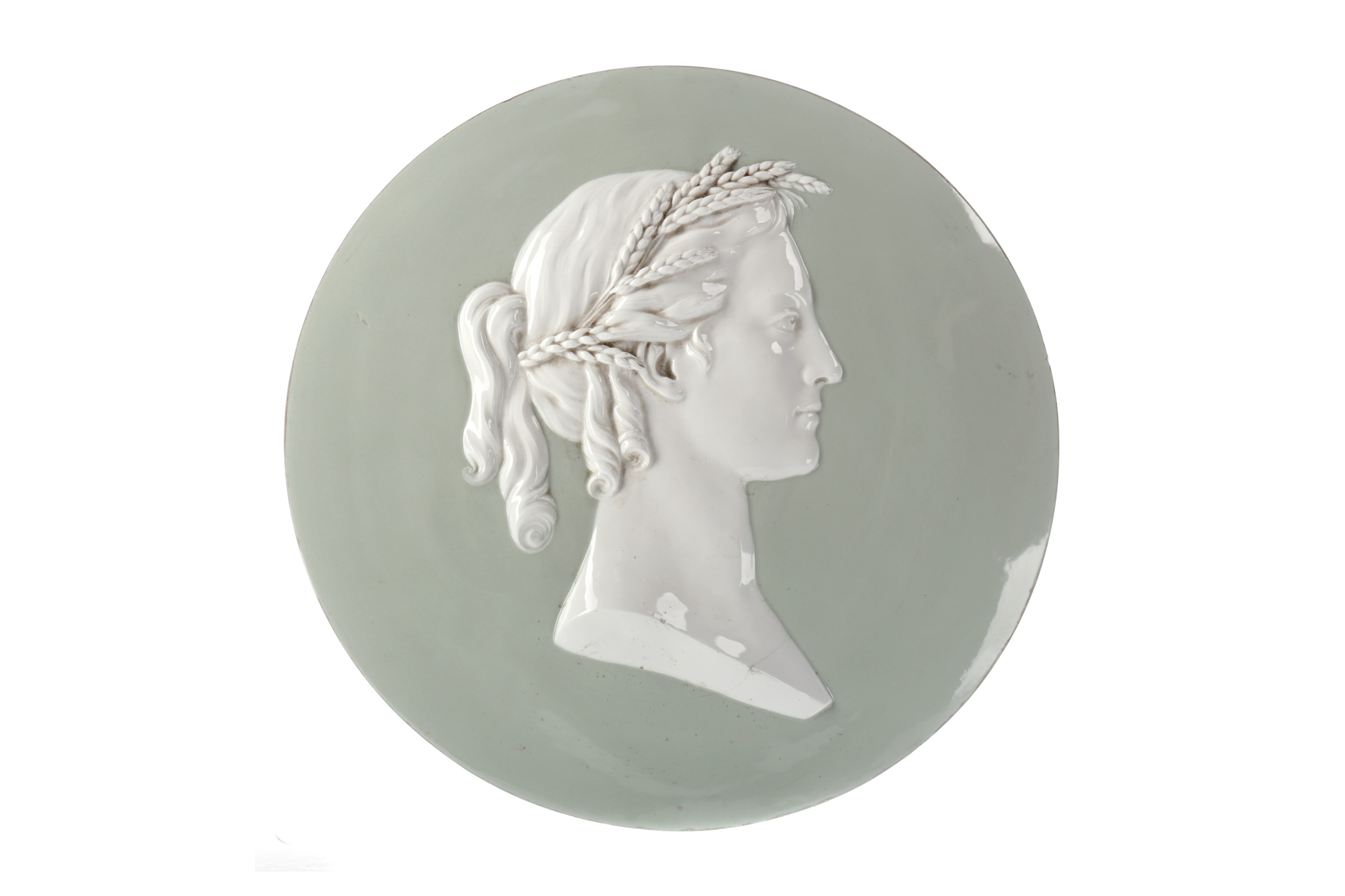 A LATE 19TH CENTURY CERAMIC PORTRAIT ROUNDEL