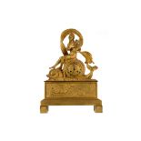 A FRENCH EMPIRE ORMOLU MANTEL CLOCK