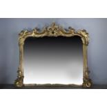 A GILTWOOD OVERMANTEL MIRROR