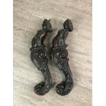 A PAIR OF 18TH CENTURY CARVED OAK CARYATID PILASTERS
