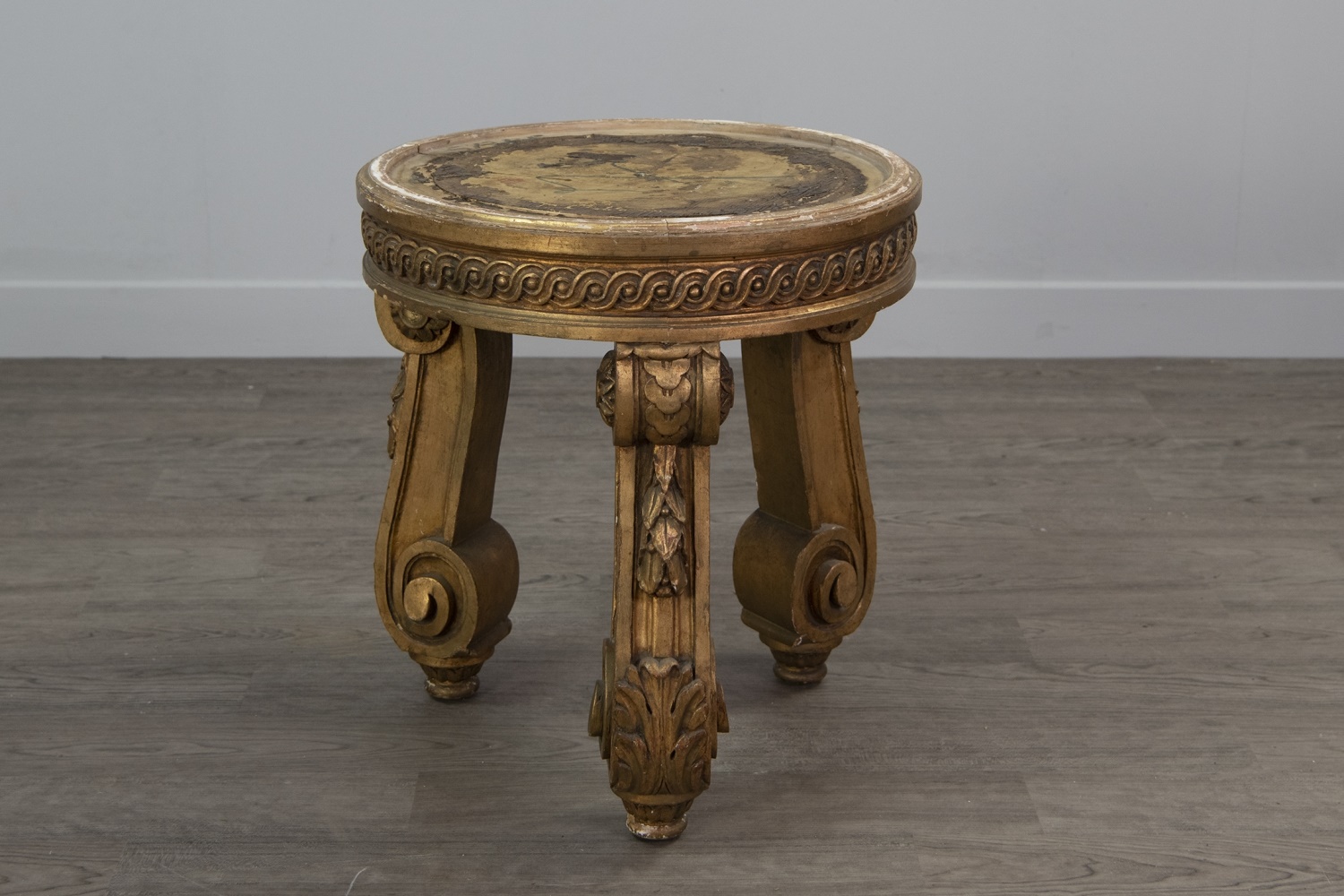 A FRENCH GILT-WOOD CIRCULAR JARDINIERE STAND