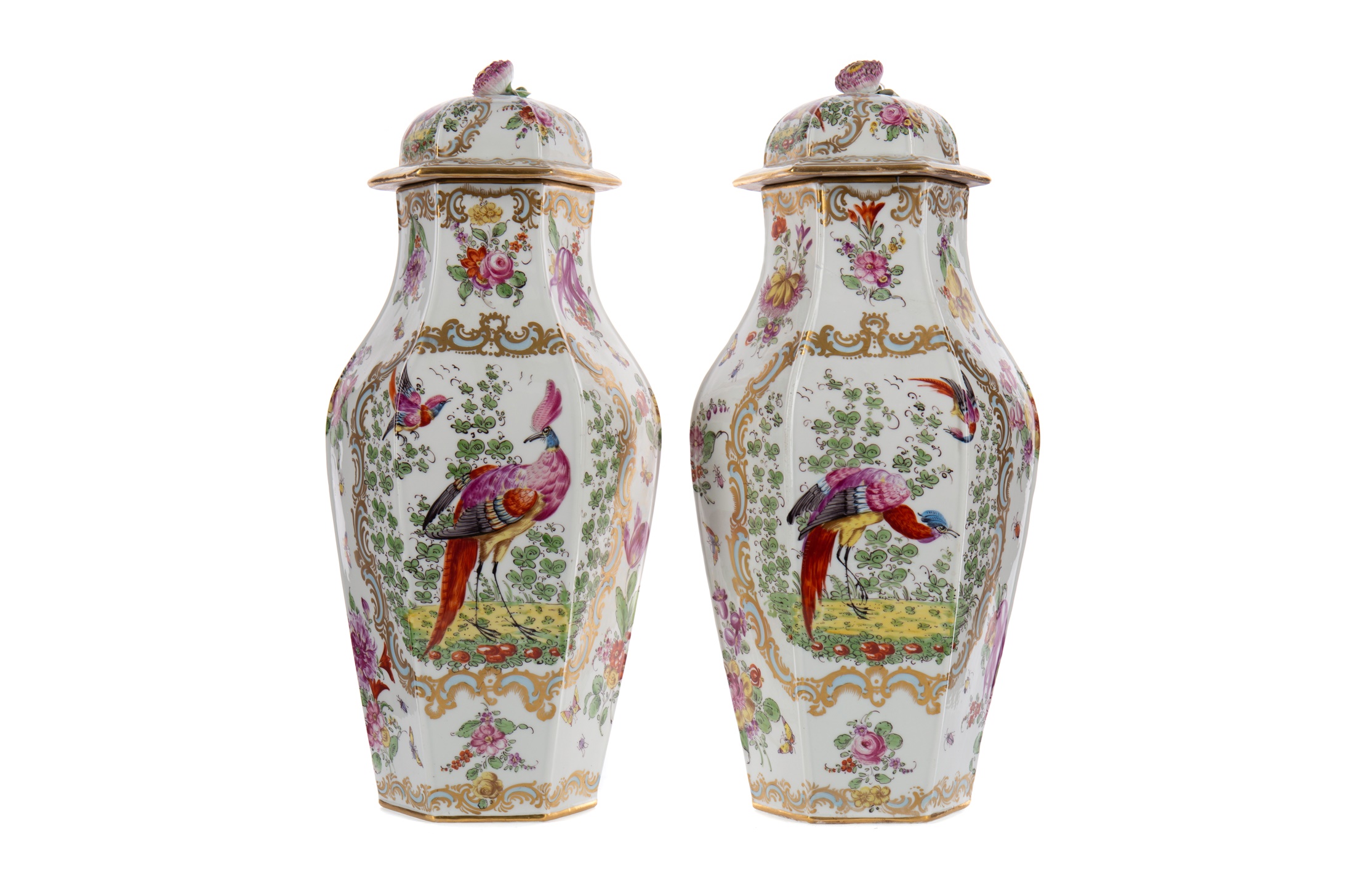 A PAIR OF LATE 19TH CENTURY CONTINENTAL PORCELAIN VASES AND COVERS