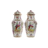 A PAIR OF LATE 19TH CENTURY CONTINENTAL PORCELAIN VASES AND COVERS