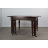 A REGENCY MAHOGANY EXTENDING DINING TABLE