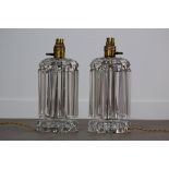 A PAIR OF EARLY 20TH CENTURY CUT GLASS TABLE LAMP LUSTRES
