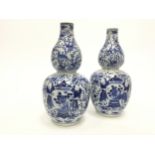 A PAIR OF 19TH CENTURY CHINESE BLUE & WHITE PORCELAIN VASES