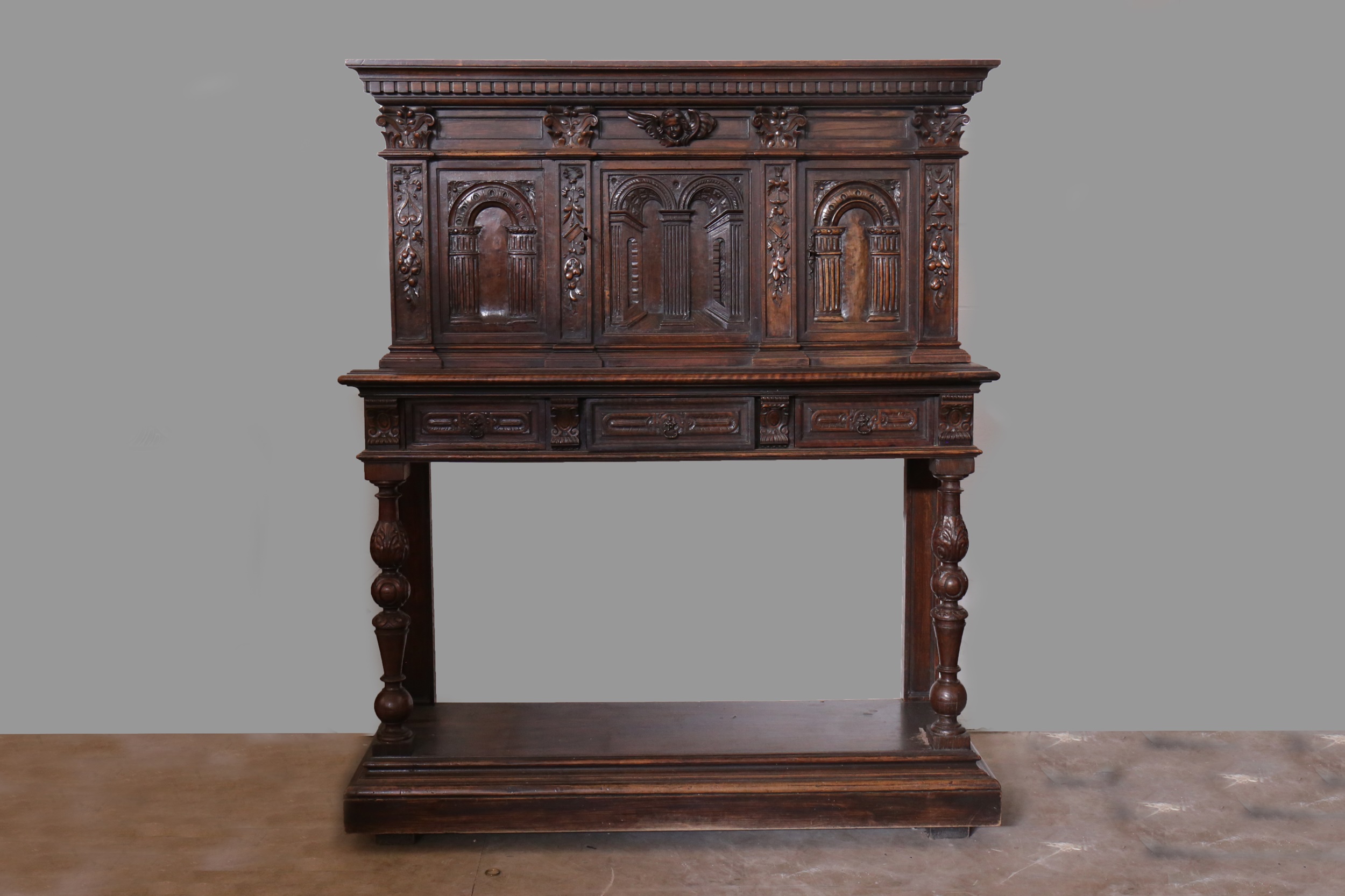 A 19TH CENTURY ITALIAN WALNUT COURT CUPBOARD