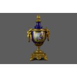 A LATE 19TH CENTURY ORMOLU MOUNTED CONTINENTAL PORCELAIN VASE AND COVER