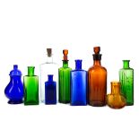 A COLLECTION OF EARLY 20TH CENTURY GLASS PHARMACEUTICAL AND OTHER BOTTLES