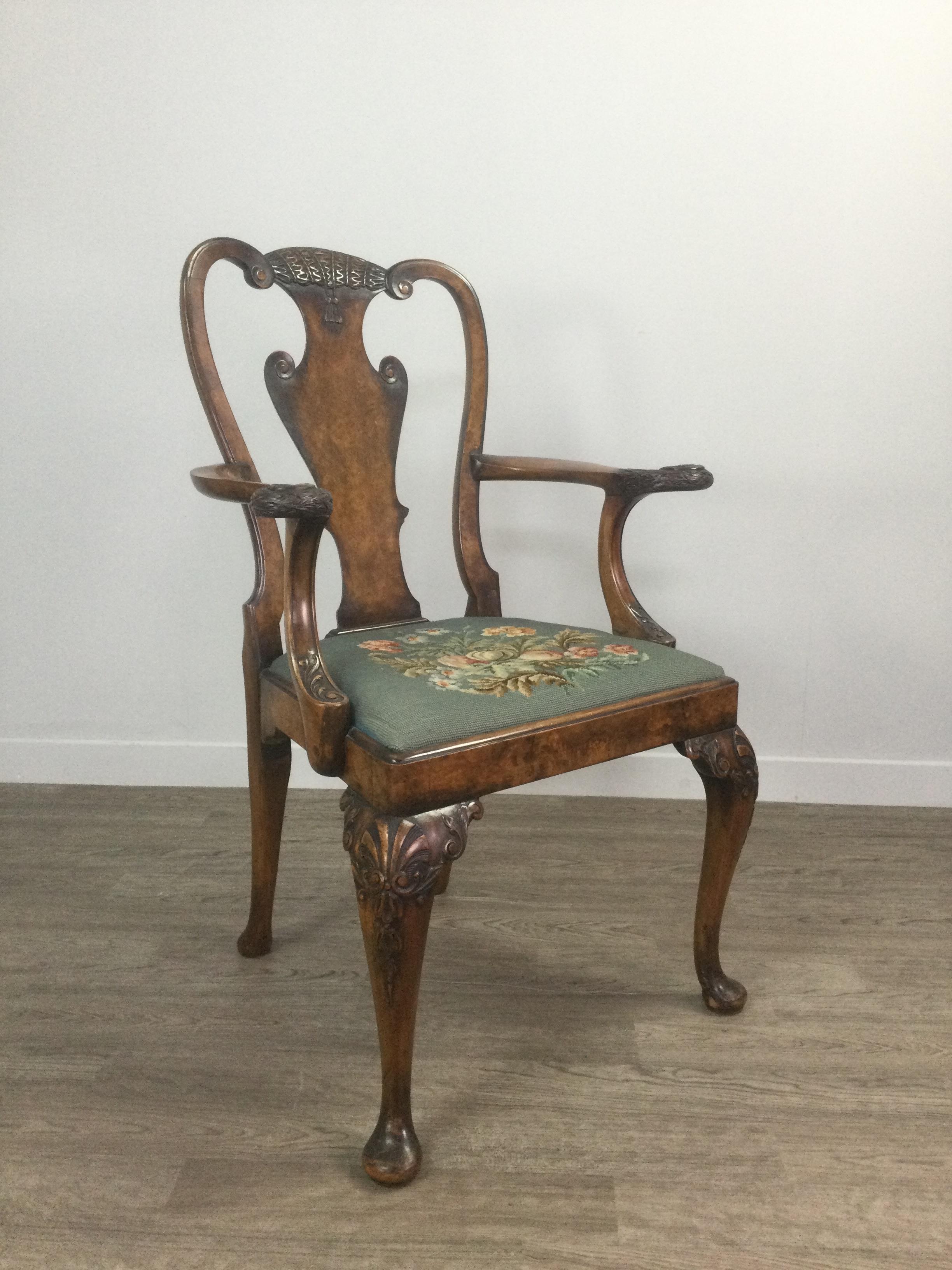 A WALNUT OPEN ELBOW CHAIR OF QUEEN ANNE DESIGN