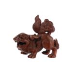 A 20TH CENTURY CHINESE TERRACOTTA FIGURE OF A FOE DOG