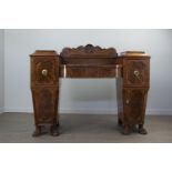 A REGENCY MAHOGANY PEDESTAL SIDEBOARD