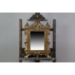A PAIR OF 19TH CENTURY GILT-WOOD UPRIGHT WALL MIRRORS