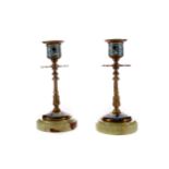 A PAIR OF LATE 19TH CENTURY BRASS AND CHAMPLEVÉ ENAMEL CANDLESTICKS
