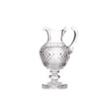 AN EARLY 19TH CENTURY CUT GLASS CLARET JUG