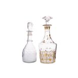 AN EARLY 20TH CENTURY CUT GLASS DECANTER, ALONG WITH ANOTHER