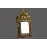 A 19TH CENTURY DUTCH BRASS FRAMED WALL MIRROR