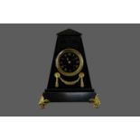 A VICTORIAN 'EGYPTIAN REVIVAL' BLACK SLATE MANTEL CLOCK