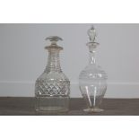A LATE VICTORIAN CUT GLASS DECANTER, ALONG WITH ANOTHER