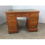 A VICTORIAN WALNUT PEDESTAL WRITING DESK