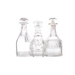 A COLLECTION OF THREE 19TH CENTURY CUT GLASS DECANTERS