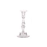 A GEORGE III GLASS CANDLESTICK