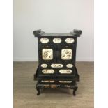 A LATE 19TH CENTURY JAPANESE LACQUERED EBONISED AND SHIBAYAMA INLAID CABINET (KODANSU)