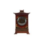 AN EDWARDIAN 'CHINESE CHIPPENDALE' MANTEL CLOCK