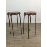 A PAIR OF EDWARDIAN MAHOGANY OVAL URN STANDS