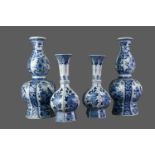 A PAIR OF EARLY 20TH CENTURY DELFT BLUE AND WHITE VASES, ALONG WITH ANOTHER PAIR