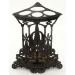 A VICTORIAN CAST IRON CORNER UMBRELLA STAND BY THE COALBROOKDALE CO, LATE 19TH C, DECORATED WITH