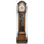 AN OAK LONGCASE CLOCK, C1930, THE BREAKARCHED BRASS DIAL WITH SILVERED RING TO THE ARCH INSCRIBED ST