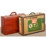 VINTAGE LUGGAGE. A RED LEATHER SUITCASE, C1950, 61CM W AND A CONTEMPORARY CABIN TRUNK, 67CM W
