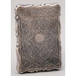 A NORTH AMERICAN SILVER CARD CASE, MID 19TH C, ENGRAVED WITH FLOWERS AND FOLIAGE, 10CM H, INDISTINCT