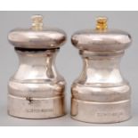 A GRADUATED PAIR OF ELIZABETH II SILVER SALT AND PEPPER MILLS, 10 AND 10.5CM H, BY A J POOLE,