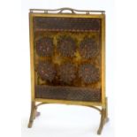 AN EDWARDIAN GILTWOOD FIRE SCREEN, C1910, WITH EARLIER GOLD-VELVET GROUND METAL THREAD APPLIQUE