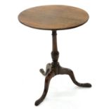 AN OAK TRIPOD TABLE, EARLY 19TH C, 68CM H; 55CM DIAM Top surface scuffed and marked consistent