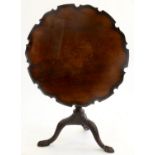 A CARVED MAHOGANY TRIPOD TABLE, C1900, IN GEORGE II STYLE, ON CLAW AND BALL FEET, 71CM H; 81CM DIAM,