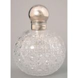 A VICTORIAN SILVER MOUNTED GLOBULAR CUT GLASS SCENT BOTTLE OF UNUSUALLY LARGE SIZE WITH GLOBULAR