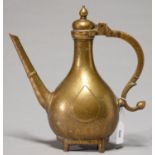 A MUGHAL BRASS EWER, NORTH INDIA OR DECCAN, FIRST HALF 19TH C, OF TYPICAL DROP SHAPE WITH DOMED LID